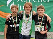 14 July 2012; Winner of the Boy's Under-13 60m Hurdles event Jerry Kerry, Craughwell A.C., Co. Galway, with second place Shane Monagle, Tramore A.C., Co. Waterford, left, and third place Aaron Smith, Menapians A.C., Co. Wexford, right. Woodie’s DIY Juvenile Track and Field Championships of Ireland, Tullamore Harriers Stadium, Tullamore, Co. Offaly. Picture credit: Tomas Greally / SPORTSFILE