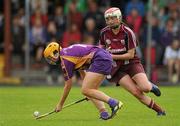 14 July 2012; Deirdre Codd, Wexford, in action against Niamh McGrath, Galway. All-Ireland Senior Camogie Championship Round Four, in association with RTÉ Sport, Galway v Wexford, Kenny Park, Athenry, Co. Galway. Picture credit: Pat Murphy / SPORTSFILE