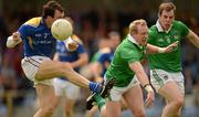 14 July 2012; Limerick's Stephen Kelly blocks a shot on goal by the Longford captain Paul Barden. GAA Football All-Ireland Senior Championship Qualifier, Round 2, Longford v Limerick, Glennon Brothers Pearse Park, Longford. Picture credit: Ray McManus / SPORTSFILE
