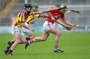 14 July 2012; Niall McCarthy, Cork, in action against Darren Stamp and Keith Rossiter, Wexford. GAA Hurling All-Ireland Senior Championship, Phase 3, Wexford v Cork, Semple Stadium, Thurles, Co. Tipperary. Picture credit: Matt Browne / SPORTSFILE