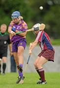 14 July 2012; Katrina Parrock, Wexford, in action against Regina Glynn, Galway. All-Ireland Senior Camogie Championship Round Four, in association with RTÉ Sport, Galway v Wexford, Kenny Park, Athenry, Co. Galway. Picture credit: Pat Murphy / SPORTSFILE