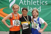 14 July 2012; Winner of the Girl's Under-12 High Jump event Sophie O'Sullivan, Ballymore A.C., Co. Cork, with second place Niamh O'Neill, Claremorris A.C., Co. Mayo, left, and third place Sophie Meredith, St. Marys A.C., Co. Limerick, right. Woodie’s DIY Juvenile Track and Field Championships of Ireland, Tullamore Harriers Stadium, Tullamore, Co. Offaly. Picture credit: Tomas Greally / SPORTSFILE