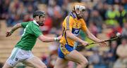 14 July 2012; Aaron Cunningham, Clare, in action against Wayne McNamara, Limerick. GAA Hurling All-Ireland Senior Championship, Phase 3, Limerick v Clare, Semple Stadium, Thurles, Co. Tipperary. Picture credit: Stephen McCarthy / SPORTSFILE