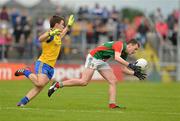 15 July 2012; Diarmuid O'Connor, Mayo, in action against Conor Hussey, Roscommon. Connacht GAA Football Minor Championship Final, Mayo v Roscommon, Dr. Hyde Park, Roscommon. Picture credit: Barry Cregg / SPORTSFILE