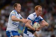 15 July 2012; Pádraig Clancy, Laois, in action against Vincent Corey, Monaghan. GAA Football All-Ireland Senior Championship Qualifier, Round 2, Laois v Monaghan, O'Moore Park, Portlaoise, Co. Laois. Picture credit: Dáire Brennan / SPORTSFILE