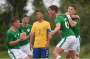 27 September 2017; Conor Power, 6, of Republic of Ireland celebrates with team-mates, from left, Séamas Keogh, Cian Kelly and Matt Everitt after scoring his side's first goal during the International Friendly match between Republic of Ireland and Brazil at the AUL Complex in Dublin. Photo by Piaras Ó Mídheach/Sportsfile