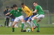 27 September 2017; Giovanni Ribeiro of Brazil in action against James Furlong, left, and Conor Carty of Republic of Ireland during the International Friendly match between Republic of Ireland and Brazil at the AUL Complex in Dublin. Photo by Piaras Ó Mídheach/Sportsfile