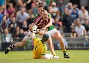 15 July 2012; Michael Ennis, Westmeath, is tackled by Eoin Brosnan and Brendan Kealy, 1, Kerry. GAA Football All-Ireland Senior Championship Qualifier, Round 2, Westmeath v Kerry, Cusack Park, Mullingar, Co. Westmeath. Picture credit: Matt Browne / SPORTSFILE