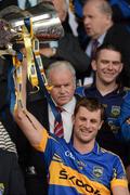 15 July 2012; Tipperary captain Paul Curran lifts the cup. Munster GAA Hurling Senior Championship Final, Waterford v Tipperary, Pairc Ui Chaoimh, Cork. Picture credit: Ray McManus / SPORTSFILE