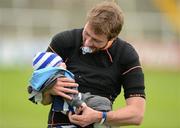 15 July 2012; Laois player Billy Sheehan celebrates with his 11 week old son Timmy after the game. GAA Football All-Ireland Senior Championship Qualifier, Round 2, Laois v Monaghan, O'Moore Park, Portlaoise, Co. Laois. Picture credit: Dáire Brennan / SPORTSFILE