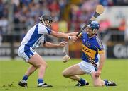 15 July 2012; Pa Bourke, Tipperary, in action against Tony Browne, Waterford. Munster GAA Hurling Senior Championship Final, Waterford v Tipperary, Pairc Ui Chaoimh, Cork. Picture credit: Stephen McCarthy / SPORTSFILE