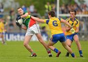 15 July 2012; Diarmuid O'Connor, Mayo, in action against Conor Hussey, centre, and Enda Smith, right, Roscommon. Connacht GAA Football Minor Championship Final, Mayo v Roscommon, Dr. Hyde Park, Roscommon. Picture credit: Barry Cregg / SPORTSFILE