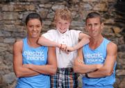 16 July 2012; Electric Ireland, proud sponsors of Team Ireland, link up with Robert and Marian Heffernan to look forward to the London 2012 Olympic Games. Rob Heffernan competes in the 20km walk on August 4th and the 50km walk on August 11th, while Marian begins her event, the 4X400m relay on August 10th. Pictured with Rob and Marian Heffernan is their son Cathal, age 7. Ely Place, Dublin. Picture credit: David Maher / SPORTSFILE