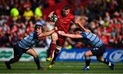 30 September 2017; Robin Copeland of Munster is tackled by Jarrod Evans, left, and Matthew Rees of Cardiff Blues during the Guinness PRO14 Round 5 match between Munster and Cardiff Blues at Thomond Park in Limerick. Photo by Brendan Moran/Sportsfile