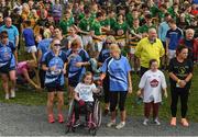 30 September 2017; Athletes warm up before the Run for Adam Burke at Two Mile House GAA Club in Kildare. Photo by Ray McManus/Sportsfile