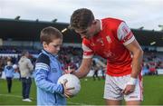 30 September 2017; Michael Fitzsimons of Cuala signs a ball for a young supporter following the Dublin County Senior Football Championship Quarter-Final match between Cuala and St Jude's at Parnell Park in Dublin. Photo by David Fitzgerald/Sportsfile