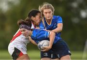 30 September 2017; Katlynn Doran and Molly Fitzgerald of Leinster are tackles by Mya Alcorn of Ulster during the U18 Interprovincial Series match between Leinster and Ulster at North Kildare RFC in Kilcock, Co Kildare. Photo by Matt Browne/Sportsfile