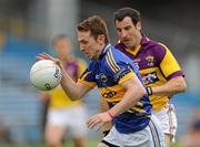 14 July 2012; Brian Mulvihill, Tipperary, in action against Graeme Molloy, Wexford. GAA Football All-Ireland Senior Championship Qualifier, Round 2, Tipperary v Wexford, Semple Stadium, Thurles, Co. Tipperary. Picture credit: Matt Browne / SPORTSFILE