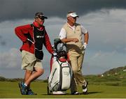 28 June 2012; Darren Clarke, right, and his caddie Phil Morbey during the 2012 Irish Open Golf Championship. Royal Portrush, Portrush, Co. Antrim. Picture credit: Oliver McVeigh / SPORTSFILE