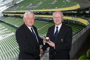 20 July 2012; Outgoing IRFU President John Hussey, left, presents the new IRFU President Billy Glynn with his pin of office after the IRFU Annual Council meeting. Aviva Stadium, Lansdowne Road, Dublin. Picture credit: Matt Browne / SPORTSFILE