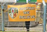 21 July 2012; Pat O'Hagan, right, and Joe Loughran, both from Belfast, Co. Antrim, tie up a banner showing support for their team. GAA Football All-Ireland Senior Championship Qualifier, Round 3, Tipperary v Antrim, Semple Stadium, Thurles, Co. Tipperary. Picture credit: Barry Cregg / SPORTSFILE