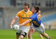 21 July 2012; Michael McCann, Antrim, in action against Donagh Leahy, Tipperary. GAA Football All-Ireland Senior Championship Qualifier, Round 3, Tipperary v Antrim, Semple Stadium, Thurles, Co. Tipperary. Picture credit: Barry Cregg / SPORTSFILE