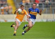 21 July 2012; Tony Scullion, Antrim, in action against Peter Acheson, Tipperary. GAA Football All-Ireland Senior Championship Qualifier, Round 3, Tipperary v Antrim, Semple Stadium, Thurles, Co. Tipperary. Picture credit: Barry Cregg / SPORTSFILE
