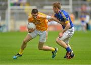21 July 2012; Conor Murray, Antrim, in action against Brian Fox, Tipperary. GAA Football All-Ireland Senior Championship Qualifier, Round 3, Tipperary v Antrim, Semple Stadium, Thurles, Co. Tipperary. Picture credit: Barry Cregg / SPORTSFILE