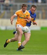 21 July 2012; Tony Scullion, Antrim, in action against Peter Acheson, Tipperary. GAA Football All-Ireland Senior Championship Qualifier, Round 3, Tipperary v Antrim, Semple Stadium, Thurles, Co. Tipperary. Picture credit: Barry Cregg / SPORTSFILE