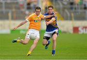 21 July 2012; Conor Murray, Antrim, in action against Philip Austin, Tipperary. GAA Football All-Ireland Senior Championship Qualifier, Round 3, Tipperary v Antrim, Semple Stadium, Thurles, Co. Tipperary. Picture credit: Barry Cregg / SPORTSFILE