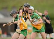 21 July 2012; Elaine Aylward, Kilkenny, in action against Arlene Watkins, left, and Elaine Dermody, Offaly. All-Ireland Senior Camogie Championship Play-Off, Offaly v Kilkenny, St. Brendan's Park, Birr, Co. Offaly. Picture credit: Daire Brennan / SPORTSFILE