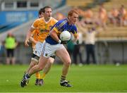 21 July 2012; George Hannigan, Tipperary, in action against Michael McCann, Antrim. GAA Football All-Ireland Senior Championship Qualifier, Round 3, Tipperary v Antrim, Semple Stadium, Thurles, Co. Tipperary. Picture credit: Barry Cregg / SPORTSFILE