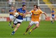 21 July 2012; Philip Austin, Tipperary, in action against James Loughrey, Antrim. GAA Football All-Ireland Senior Championship Qualifier, Round 3, Tipperary v Antrim, Semple Stadium, Thurles, Co. Tipperary. Picture credit: Barry Cregg / SPORTSFILE