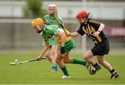21 July 2012; Michaela Morkan, Offaly, in action against Jacqui Frisby, Kilkenny. All-Ireland Senior Camogie Championship Play-Off, Offaly v Kilkenny, St. Brendan's Park, Birr, Co. Offaly. Picture credit: Daire Brennan / SPORTSFILE