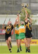 21 July 2012; Edel Maher, right, and team-mate Grace Walsh, Kilkenny, in action against Marion Crean, right, and Siobhán Flannery, Offaly. All-Ireland Senior Camogie Championship Play-Off, Offaly v Kilkenny, St. Brendan's Park, Birr, Co. Offaly. Picture credit: Daire Brennan / SPORTSFILE