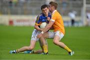 21 July 2012; Michael Quinlivan, Tipperary, in action against Mark Sweeney, Antrim. GAA Football All-Ireland Senior Championship Qualifier, Round 3, Tipperary v Antrim, Semple Stadium, Thurles, Co. Tipperary. Picture credit: Barry Cregg / SPORTSFILE