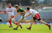 21 July 2012; Colm Cooper, Kerry, in action against Martin Penrose, left, and Colm Cavanagh, Tyrone. GAA Football All-Ireland Senior Championship Qualifier, Round 3, Kerry v Tyrone, Fitzgerald Stadium, Killarney, Co. Kerry. Picture credit: Diarmuid Greene / SPORTSFILE