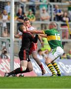 21 July 2012; Kieran Donaghy, Kerry, makes a challenge on Tyrone goalkeeper Pascal McConnell. GAA Football All-Ireland Senior Championship Qualifier, Round 3, Kerry v Tyrone, Fitzgerald Stadium, Killarney, Co. Kerry. Picture credit: Diarmuid Greene / SPORTSFILE