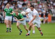 21 July 2012; Mikey Conway, Kildare, in action against Lorcan O'Dwyer, Limerick. GAA Football All-Ireland Senior Championship Qualifier, Round 3, Kildare v Limerick, O'Moore Park, Portlaoise, Co. Laois. Picture credit: Matt Browne / SPORTSFILE