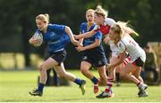 30 September 2017; Bethany Sharpe of Leinster is tackled by Kelly McCormill and Ellie Ingram of Ulster during the U18 Interprovincial Series match between Leinster and Ulster at North Kildare RFC in Kilcock, Co Kildare. Photo by Matt Browne/Sportsfile