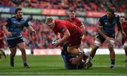 30 September 2017; John Ryan of Munster is tackled by Nick Williams on the way to scoring his side's second during the Guinness PRO14 Round 5 match between Munster and Cardiff Blues at Thomond Park in Limerick. Photo by Brendan Moran/Sportsfile