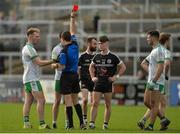 1 October 2017; Referee Paul Faloon issues Conail McGovern of Burren, hidden, with a red card during the Down County Senior Football Championship Final match between Burren and Kilcoo at Páirc Esler in Newry, Co. Down. Photo by Oliver McVeigh/Sportsfile