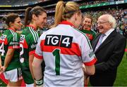 24 September 2017; President of Ireland Michael D. Higgins is introduced to Yvonne Byrne and Orla Conlon of Mayo by captain Sarah Tierney prior to the TG4 Ladies Football All-Ireland Senior Championship Final match between Dublin and Mayo at Croke Park in Dublin. Photo by Brendan Moran/Sportsfile