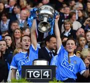 24 September 2017; Lauren Magee, left, and Aoife Kane of Dublin lift the Brendan Martin Cup after the TG4 Ladies Football All-Ireland Senior Championship Final match between Dublin and Mayo at Croke Park in Dublin. Photo by Brendan Moran/Sportsfile