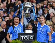 24 September 2017; Leah Caffrey, left, and Sarah McCaffrey of Dublin lift the Brendan Martin Cup after the TG4 Ladies Football All-Ireland Senior Championship Final match between Dublin and Mayo at Croke Park in Dublin. Photo by Brendan Moran/Sportsfile