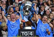 24 September 2017; Carla Rowe, left, and Martha Byrne of Dublin lift the Brendan Martin Cup after the TG4 Ladies Football All-Ireland Senior Championship Final match between Dublin and Mayo at Croke Park in Dublin. Photo by Brendan Moran/Sportsfile