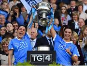 24 September 2017; Sinéad Goldrick, left, and Niamh Collins of Dublin lift the Brendan Martin Cup after the TG4 Ladies Football All-Ireland Senior Championship Final match between Dublin and Mayo at Croke Park in Dublin. Photo by Brendan Moran/Sportsfile