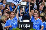 24 September 2017; Sinéad O'Mahony, left, and Fiona Hudson of Dublin lift the Brendan Martin Cup after the TG4 Ladies Football All-Ireland Senior Championship Final match between Dublin and Mayo at Croke Park in Dublin. Photo by Brendan Moran/Sportsfile