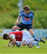 22 July 2012; Paul Corry, UCD, fouls John Russell, St. Patrick's Athletic. Airtricity League Premier Division, UCD v St. Patrick's Athletic, Belfield Bowl, UCD, Belfield, Dublin. Picture credit: Barry Cregg / SPORTSFILE