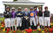 22 July 2012; The President of Ireland Michael D. Higgins with the Darley Irish Oaks jockeys, from left to right, Johnny Murtagh, Seamie Heffernan, William Buick, Colm O'Donoghue, Joseph O'Brien, Fran Berry and Pat Smullen before the start of the race. Curragh Racecourse, the Curragh, Co. Kildare. Picture credit: Matt Browne / SPORTSFILE